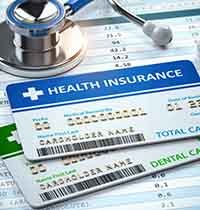 Close-up of dental and medical insurance cards 