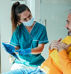 dental staff talking to patient about CDCP 