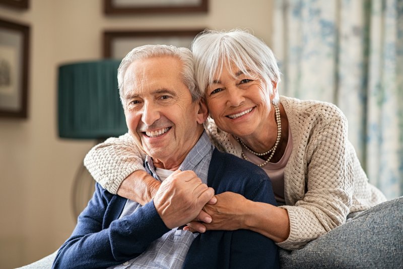 an older couple smiling